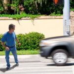 pedestrian crossing the street